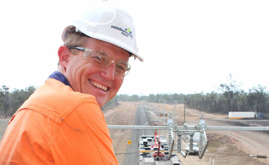 Middlemount Coal chief executive Michael Gray is visibly pleased as he watches the first coal filled train cart pass through the Middlemount Mine on Wednesday. Middlemount Coal chief executive Michael Gray is visibly pleased as he watches the first coal filled train cart pass through the Middlemount Mine on Wednesday.